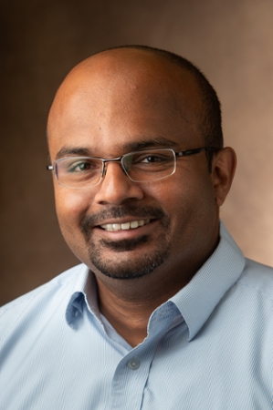 A portrait photo of Jagath Gunasekera